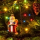 Paano magandang palamutihan ang isang Christmas tree na may isang garland?