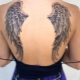 Examen de tatouage d'ailes d'ange