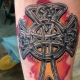 Tatuaj cu cruce celtică: semnificație și schițe