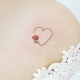 Tattoo with symbols of love