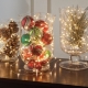 Lehetőségek az újévi dekorációhoz egy vázában
