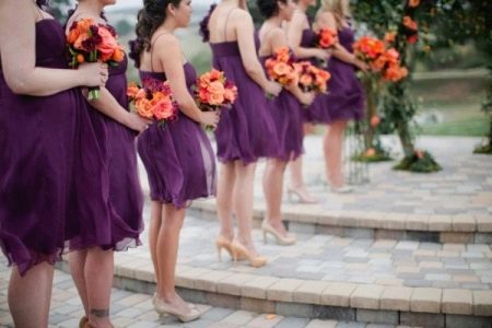 Bridesmaids in eggplant dresses