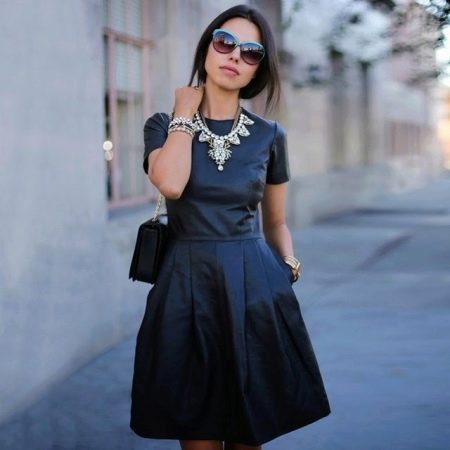 Pleated leather dress and jewelry